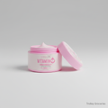 Brilliant Skin Vitamin E Moisturizing & Firming Cream 100g in a soft pink jar, styled on a clean neutral background for Trolley Groceries