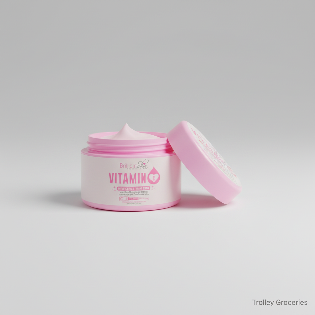 Brilliant Skin Vitamin E Moisturizing & Firming Cream 100g in a soft pink jar, styled on a clean neutral background for Trolley Groceries