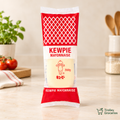 Kewpie Japanese Mayonnaise 300g squeeze pack on a warm kitchen tabletop