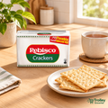 Rebisco Crackers packet on a warm kitchen counter with crisp crackers and tea.