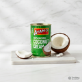 Ayam Coconut Cream 400ml green tin on marble surface with coconut