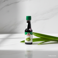 McCormick Buco Pandan Flavour Extract 20ml bottle with pandan leaves