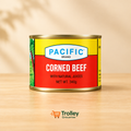 Pacific Corned Beef 340g can with Trolley Groceries branding below on a warm pantry background